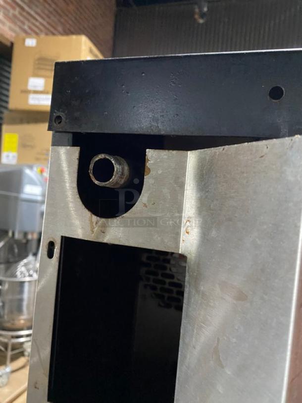 Garland Master Series stainless steel natural gas double convection oven corner detail, showing metal construction and connection port.