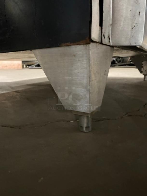 Garland Master Series stainless steel convection oven leg, showing sturdy metal construction and leg design.