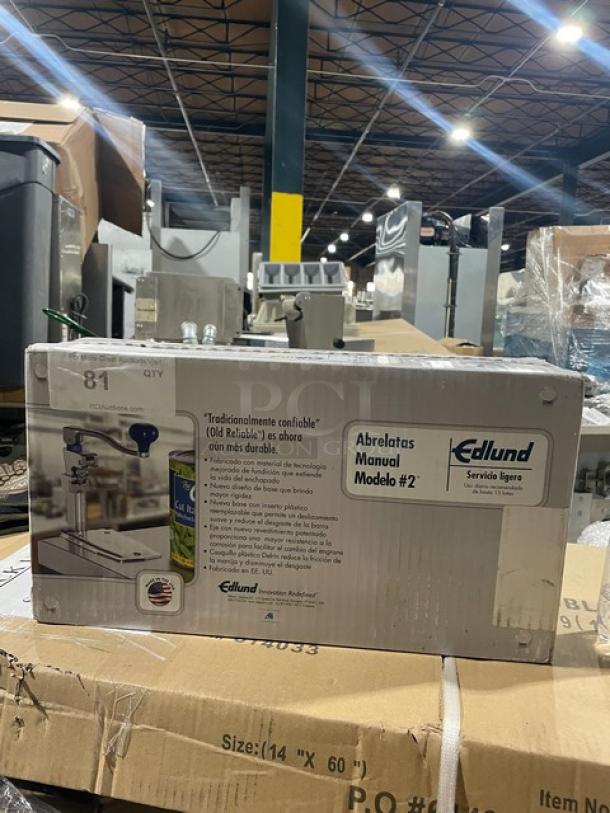 Edlund Commercial Can Opener Model 2, brand new in box, heavy-duty manual design, ideal for kitchen use.