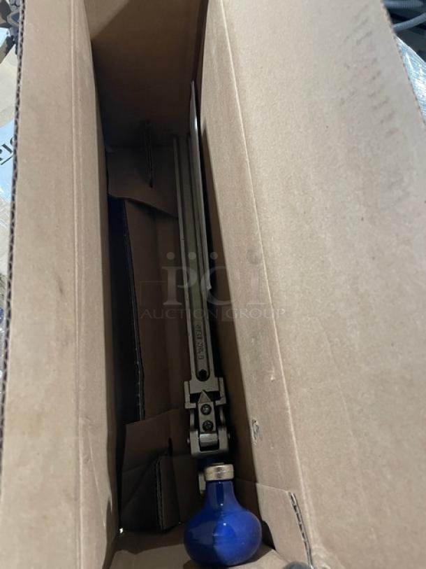 Brand new Edlund Model 2 heavy-duty manual can opener in box. Steel construction with blue handle.
