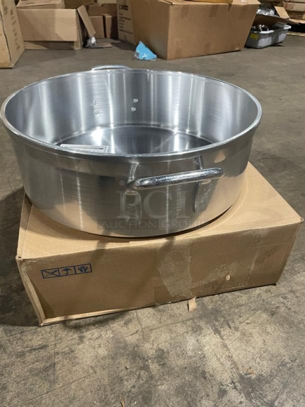 Brand new Vollrath Jacob Pride Series 18 Qt. aluminum brazier, model 68218, with handles, shown on a cardboard box.