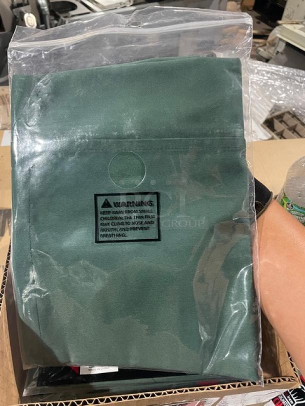 Brand new Winco Signature Chef Series green waist apron, Model WA-1221G, with 3 pockets, in original packaging.