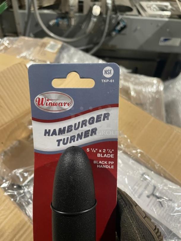 Brand new Winco Winware TKP-61 commercial stainless steel hamburger turner with black grip handle, NSF certified.