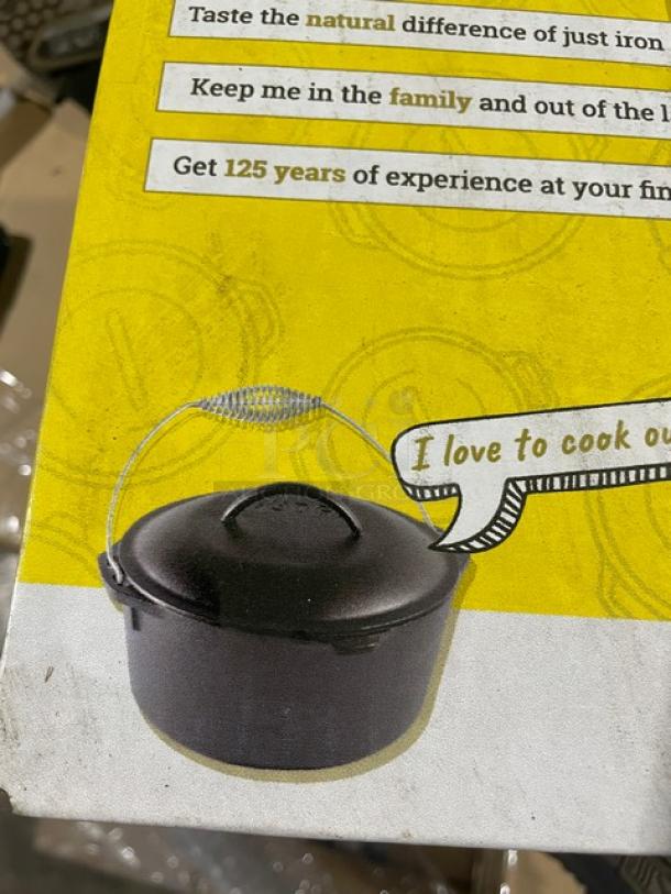 Brand new Lodge 5 Quart Cast Iron Dutch Oven with dome lid and wired spiral bail handle, model L8DO3, in box.