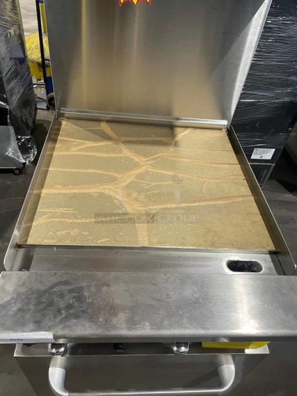 Brand new Atosa ATO-24G natural gas griddle range with stainless steel overshelf, on casters. Includes 1 rack.
