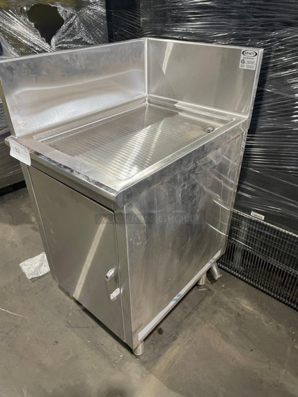 Infinity stainless steel cabinet with drain hole, model ICBD-18D-LSS-M. Features back and left side splash, on legs, excellent condition.