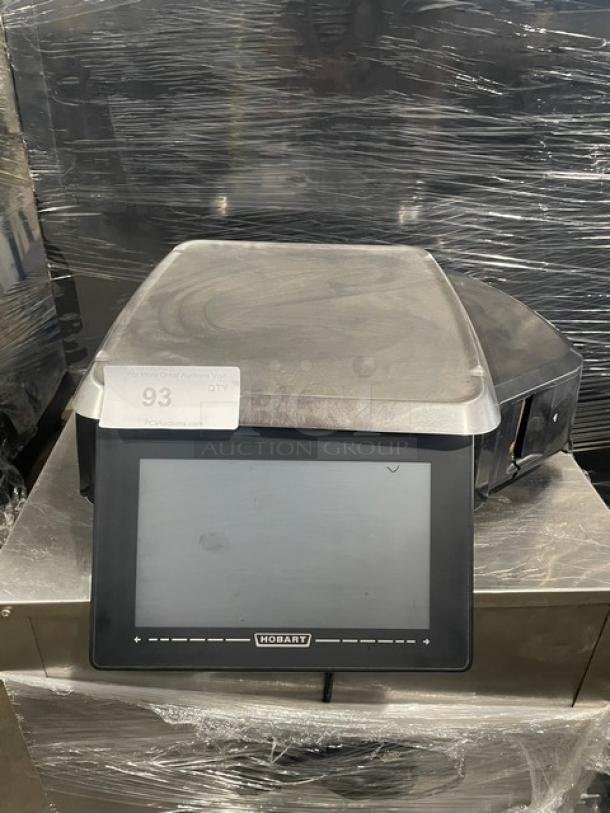 Hobart HTi commercial scale with stainless steel platform, label printer, and touchscreen display. Serial: 45-1223-253.