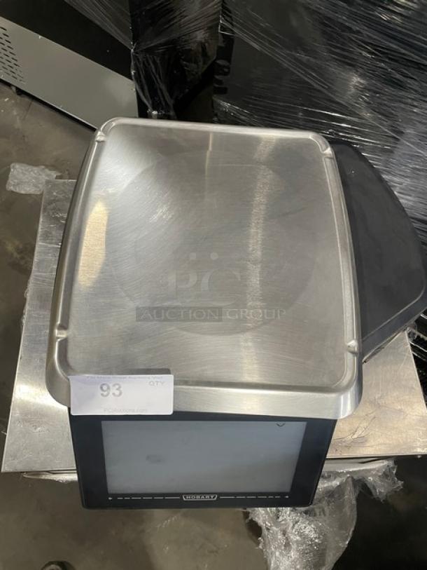 Hobart HTi commercial countertop price computing scale with label printer. Stainless steel platform, black finish, serial 45-1223-253.