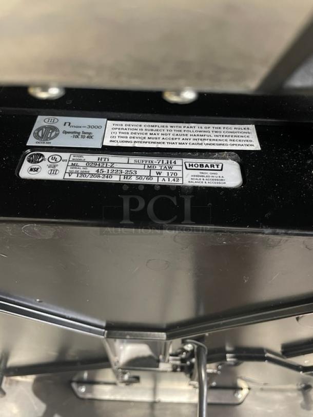 Hobart HTi commercial scale with label printer, stainless steel platform, serial: 45-1223-253, black finish, excellent condition.
