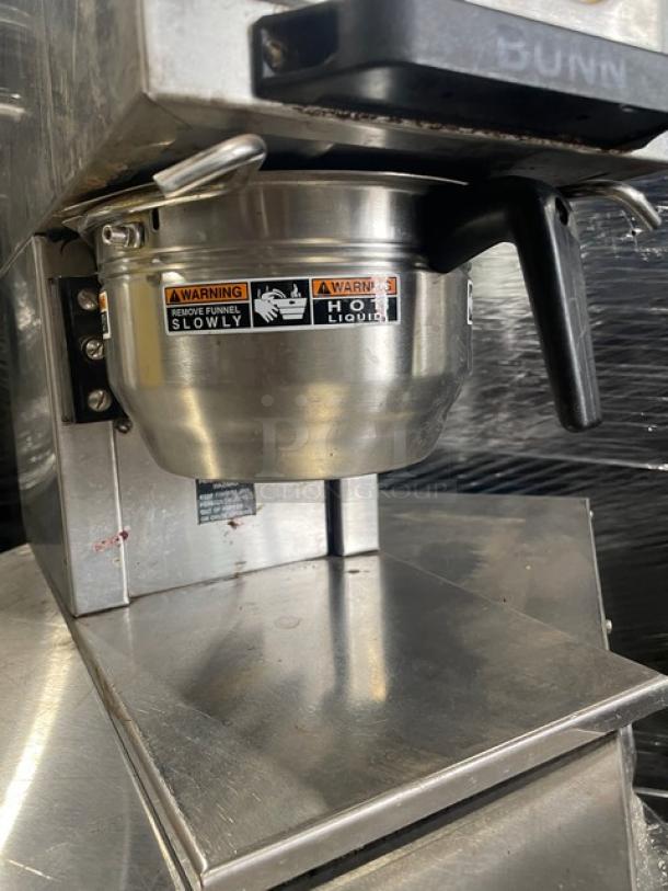 HTi G9-2T DBC espresso grinder with stainless steel finish, dual hoppers, warning labels, 120V, commercial use, good condition.