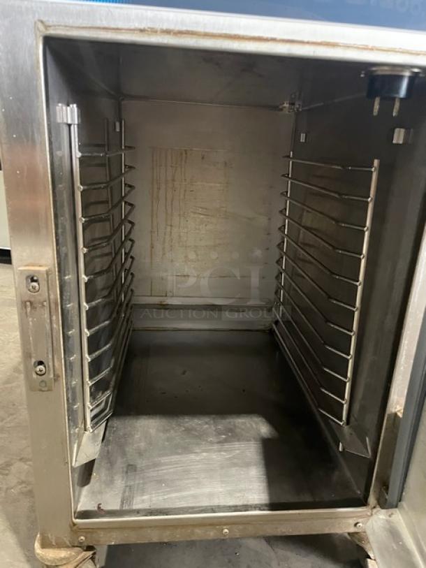Alto-Shaam 500-TH/III commercial oven, stainless steel, digital controls, pan rack, used, on casters, 120V, 1 phase.