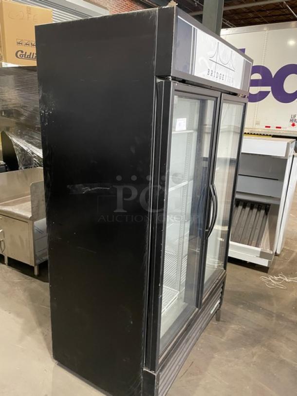 True Commercial Black Double Glass Swing Door Reach-In Merchandiser Freezer, Model GDM-43F-HC~TSL01, poly coated wire racks.