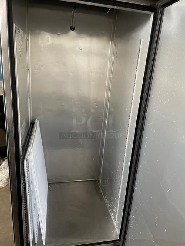 True T-23-HC stainless steel single door reach-in refrigerator, poly-coated wire racks, model T23HC, on casters.