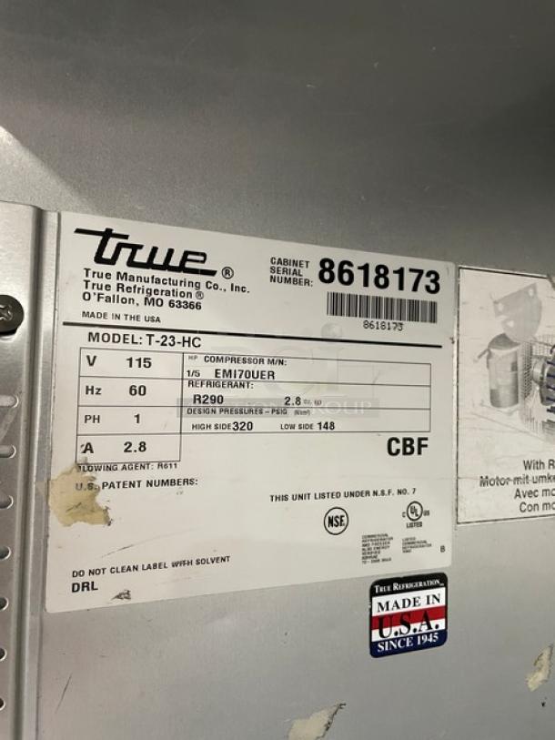 True T-23-HC refrigerator label showing model, serial number 8618173, 115V, and NSF certification.