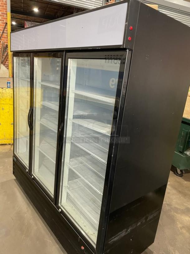 LIKE-NEW Kool-It 2020 commercial black triple glass door merchandiser fridge, model KGM75, with poly-coated wire racks, on casters.