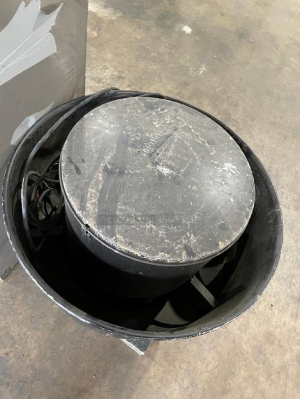 Stainless steel kitchen exhaust hood with filter and electric fan, used condition, includes wiring for installation.