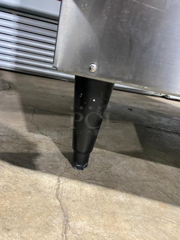 Hoshizaki KML-325MAJ ice maker's metal leg and base, showing durable stainless steel. Model: KML-325MAJ, Series: H03574L.