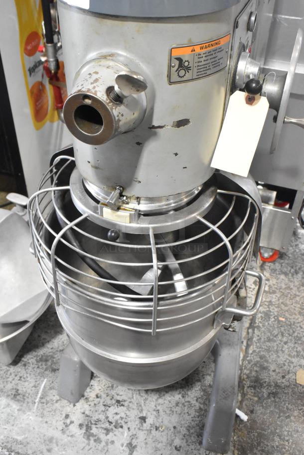 Hobart D3-40 mixer with stainless bowl, bowl guard, dough hook, paddle. Commercial-grade, good condition, 120V, 1 phase.