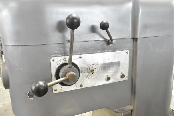 Hobart M 802 commercial dough mixer, 80-quart, metal body, control levers, 208V, 3-phase, with metal mixing bowl.