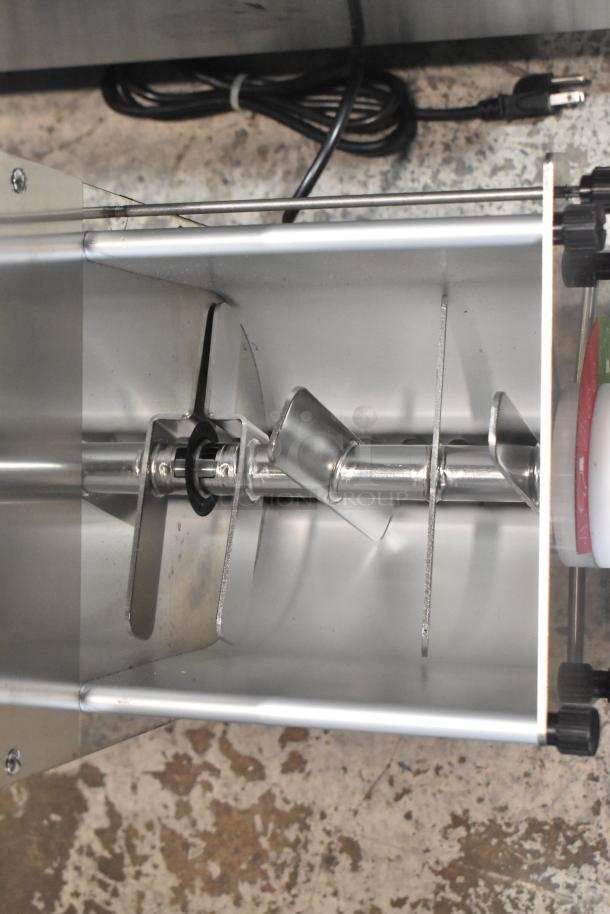 Estella 348PEM4 stainless steel pasta extruder machine, 4 lb. capacity, shown with interior components, new condition.