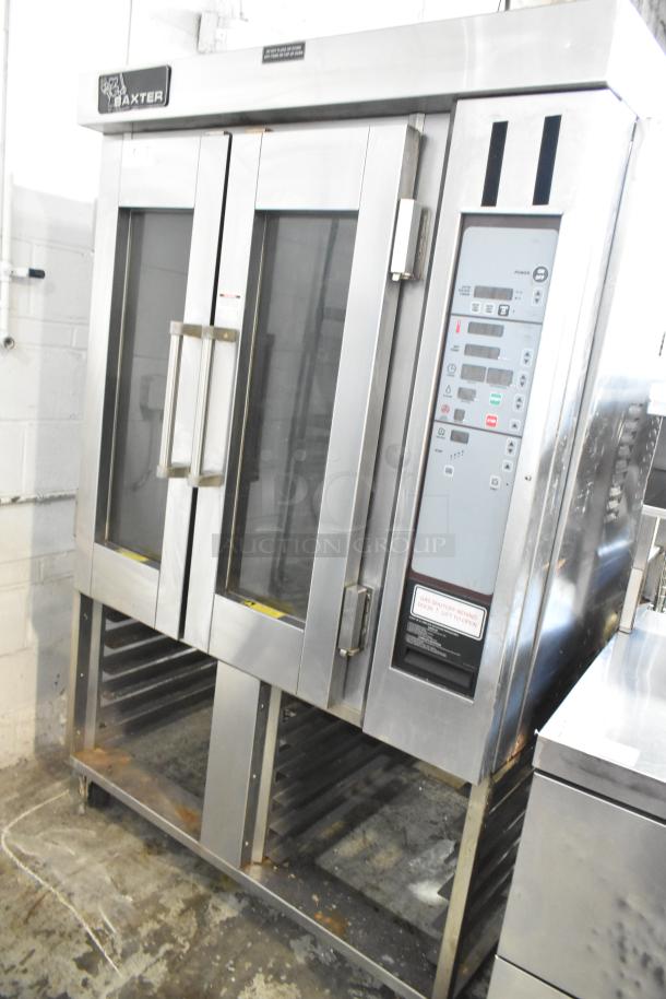 Baxter Stainless Steel Commercial Mini Rotating Rack Oven with dual pan rack on casters, in good condition. Control panel visible.