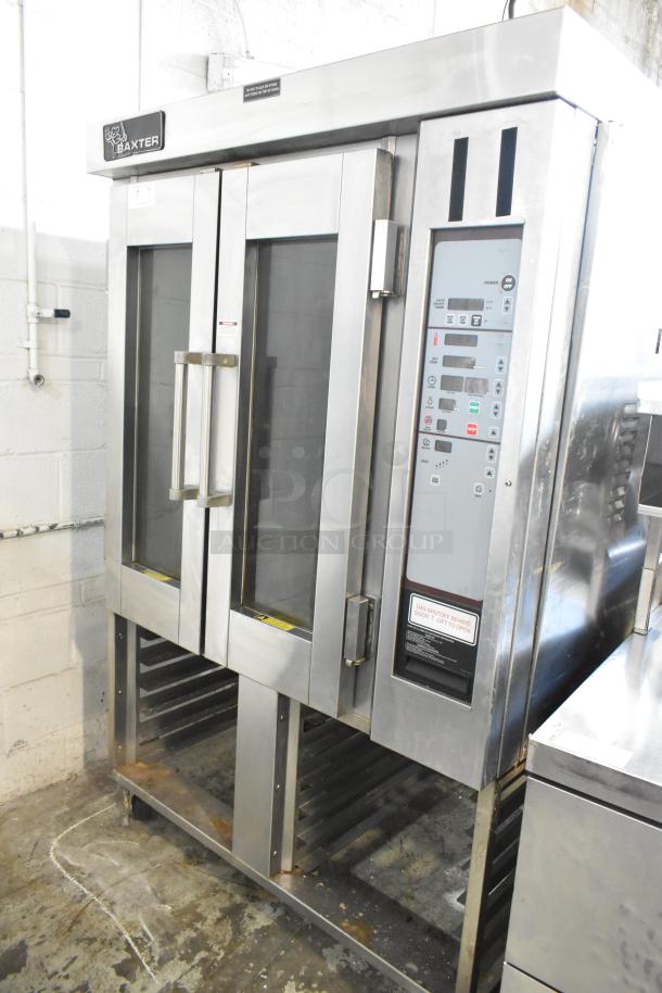 Baxter stainless steel commercial mini rotating rack oven with dual pan rack on casters, visible control panel, good condition.