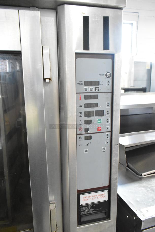 Baxter stainless steel commercial mini rotating rack oven with dual pan rack and control panel on casters, in good condition.