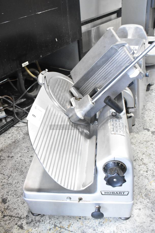 Hobart 1712 stainless steel commercial meat slicer, automatic, countertop model, 115 volts, 1 phase, in good condition.