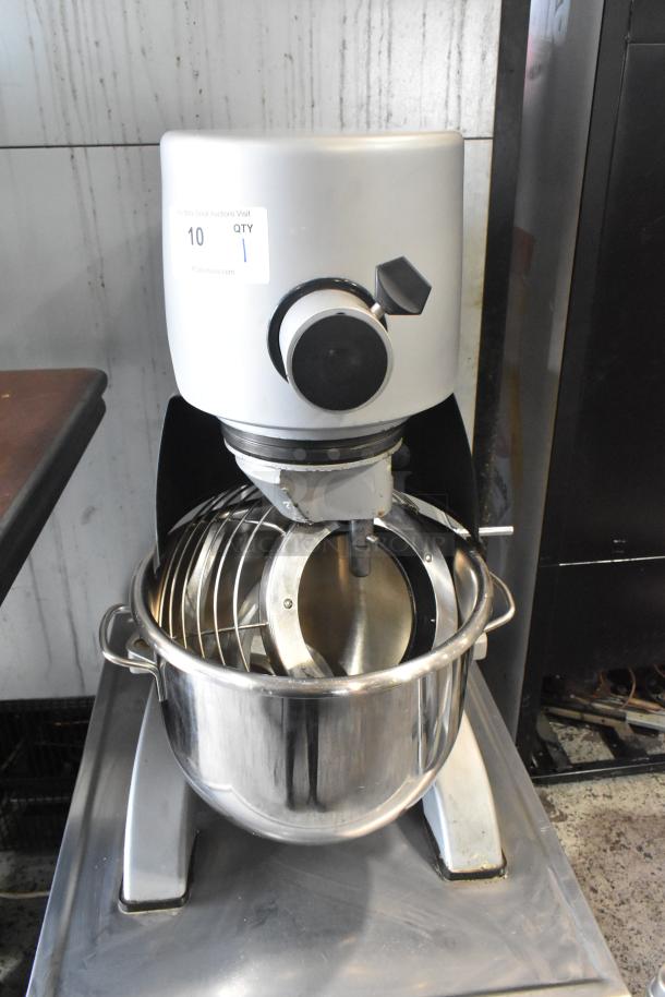 Berkel FMS20 20 Quart Planetary Dough Mixer with stainless steel bowl, bowl guard, and dough hook on equipment stand with casters.