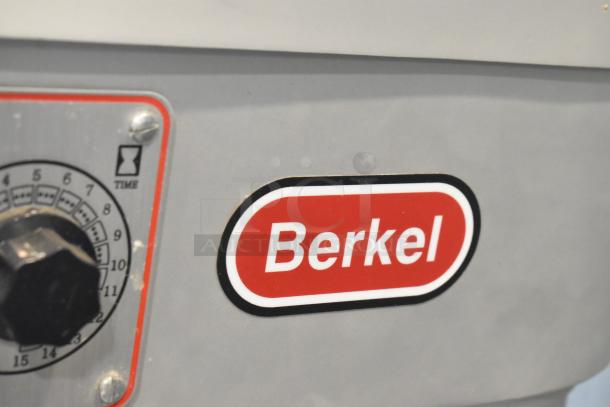 Berkel FMS20 mixer with timer dial and logo detail, featuring commercial-grade design for efficient dough mixing.