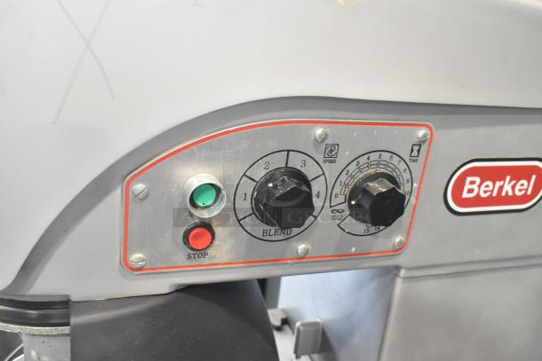 Berkel FMS20 commercial dough mixer control panel with speed and timer dials, start/stop buttons, and Berkel logo.