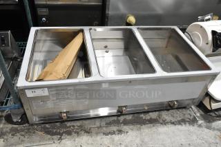 BRAND NEW ServIt 423GST3WELP stainless steel three pan steam table, 105,000 BTU, natural gas, minor scratches, with labels.