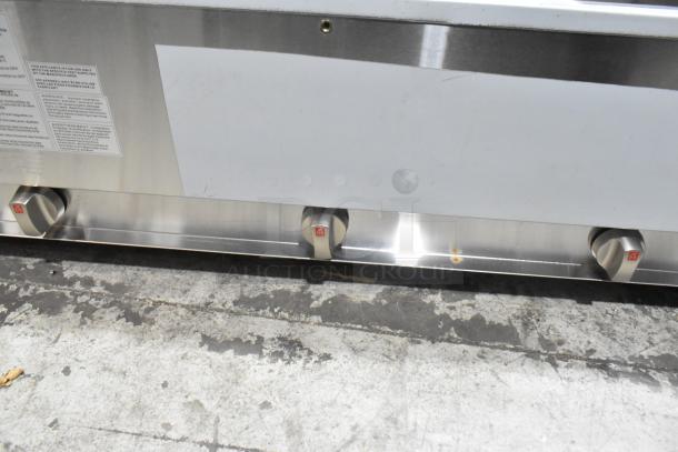 Brand new ServIt 423GST3WELP stainless steel steam table, natural gas, three-pan open well, 105,000 BTU, scratch and dent condition.
