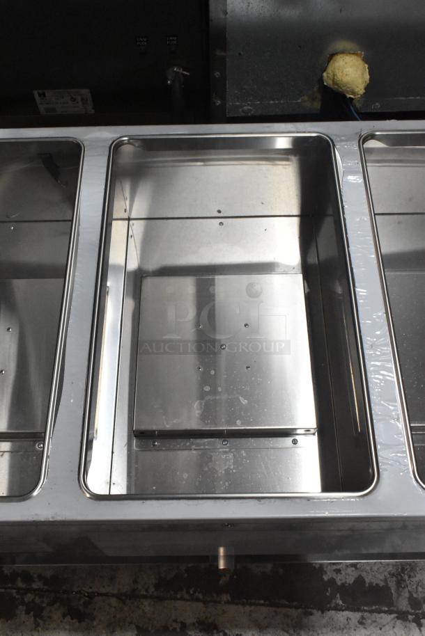 Brand new ServIt 423GST3WELP stainless steel steam table, three pan, open well, natural gas, 105,000 BTU, minor dents.