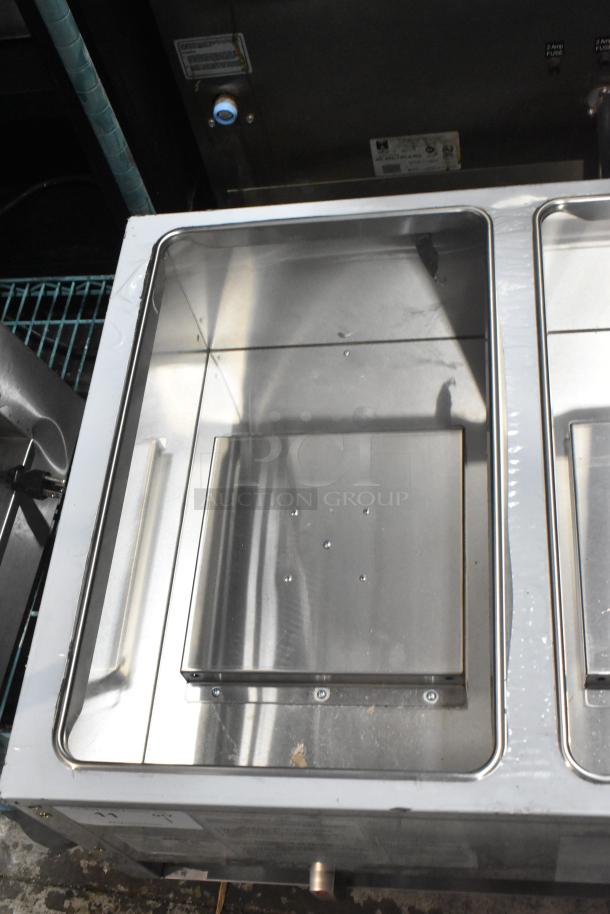 Brand new ServIt 423GST3WELP stainless steel steam table, three-pan capacity, natural gas powered, 105,000 BTU.