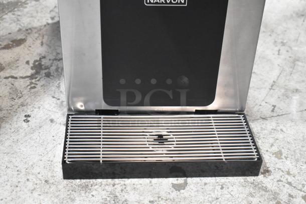 Brand new Narvon 23BCWD8HT water dispenser offering hot, chilled, ambient, and sparkling options. Scratch and dent model.