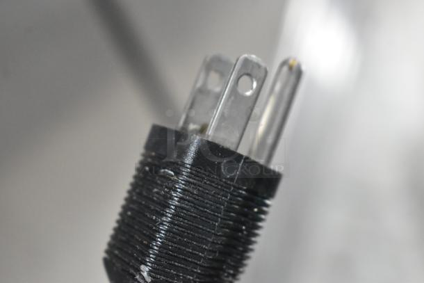Close-up of a power plug for the Narvon 23BCWD8HT 2024 countertop water dispenser.