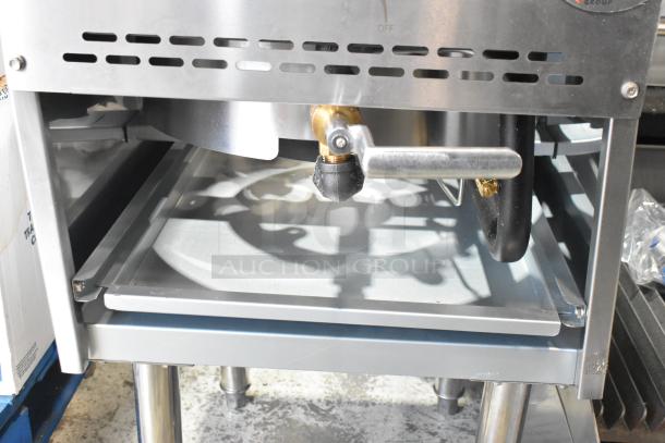 Brand new Cooking Performance Group 351WOKR16N stainless steel natural gas wok range with 16" ring, 125,000 BTU.