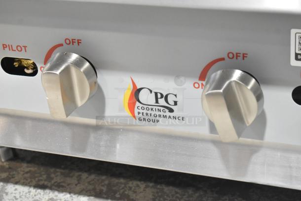 BRAND NEW CPG 351RCPG24NL stainless steel 4 burner gas countertop range; 88,000 BTU; slight scratches; visible control knobs.