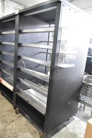 Lakeside Metal Bakery Pastry Display Case with commercial casters, 125 Volts, 1 Phase. Used condition, sturdy metal frame.