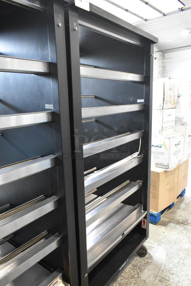 Lakeside metal bakery display case with shelves on commercial casters, 125 volts, 1 phase; ideal for bagels and pastries.