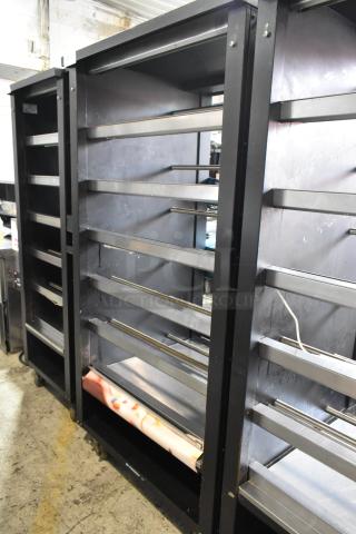 Lakeside commercial bakery bagel display case with metal shelves, black finish, on casters, 125V, 1 Phase, lightly worn.