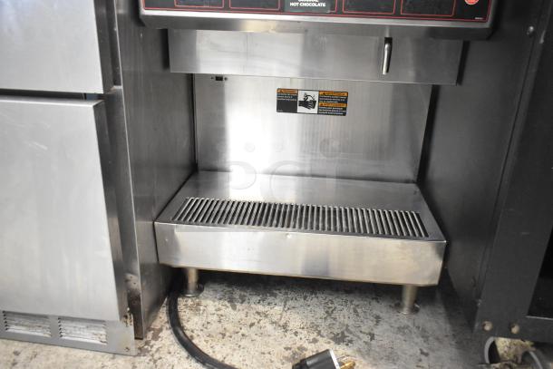 Grindmaster GB5M5 stainless steel commercial cappuccino machine, 120 volts, 1 phase, countertop design. Visible warning label.
