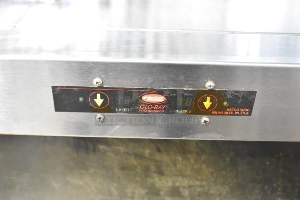 Hatco Glo Ray stainless steel commercial heated warming case, 120 volts, 1 phase, with visible control panel and logo.
