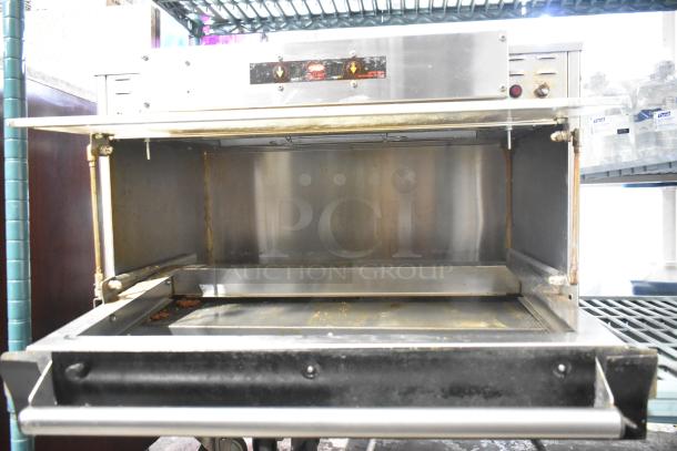 Hatco Glo Ray stainless steel commercial heated warming case, 120 volts, 1 phase, open view showing interior condition.