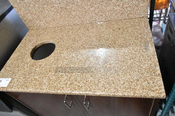 Wood pattern trash can shell with granite-like top, trash deposit hole, and two wooden doors; good condition.