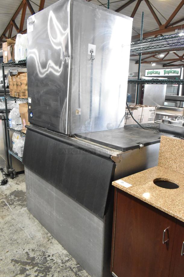 Hoshizaki KM-1340MRH stainless steel commercial ice head on ice bin, 208-230V, 1 phase, in good condition.