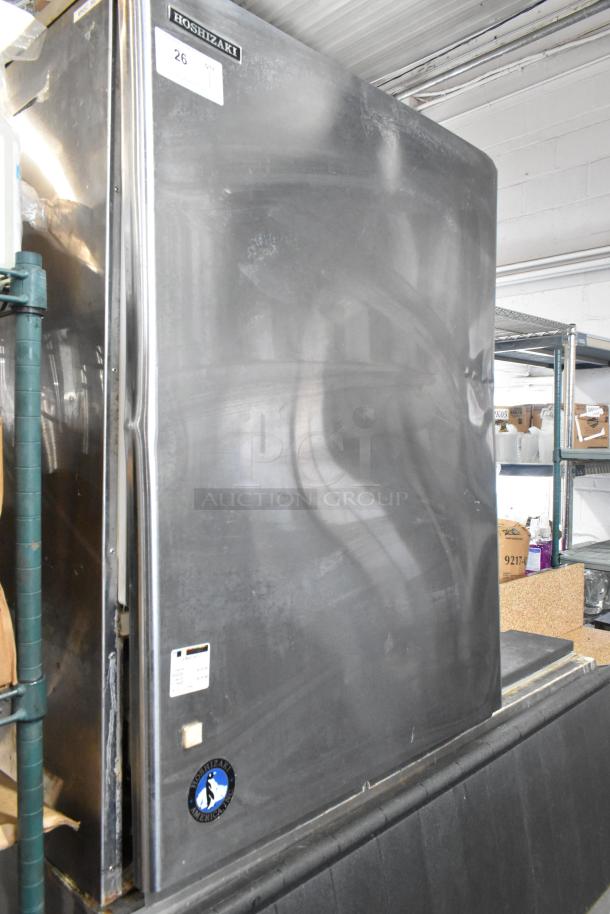 Hoshizaki KM-1340MRH stainless steel commercial ice head on ice bin, 208-230V, 1 phase, visible Hoshizaki logo, good condition.
