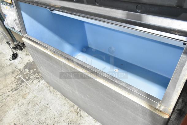 Hoshizaki KM-1340MRH commercial stainless steel ice head on bin, 208-230 volts, 1 phase, features durable construction.