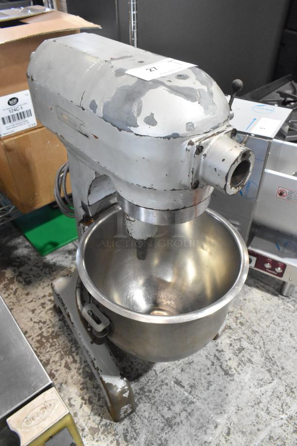 Hobart A 200 commercial countertop dough mixer with 20-quart metal bowl, showing wear, 115 volts, 1 phase.